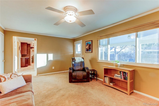 interior space featuring a wealth of natural light, light carpet, and ornamental molding