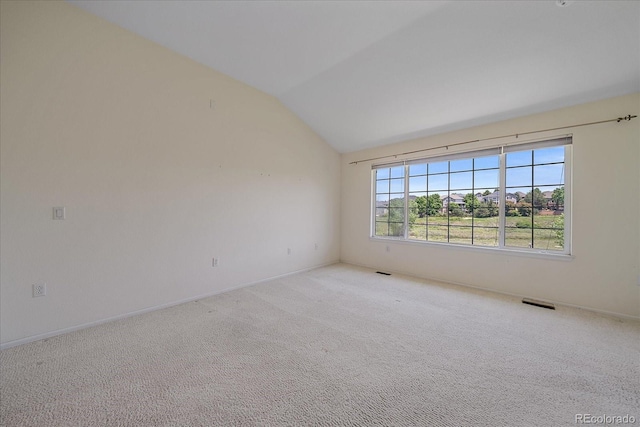 7912 S Buchanan Way, Aurora, CO 80016 - carpeted spare room featuring vaulted ceiling and baseboards