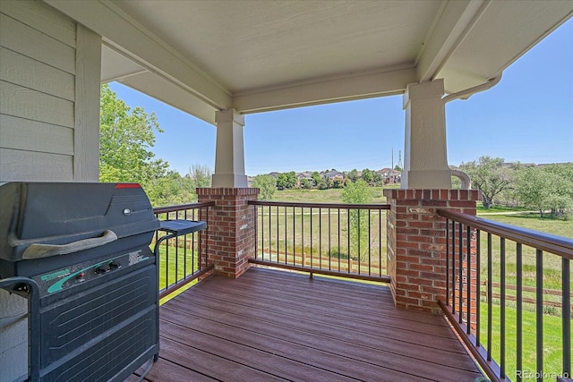 7912 S Buchanan Way, Aurora, CO 80016 - wooden terrace with grilling area