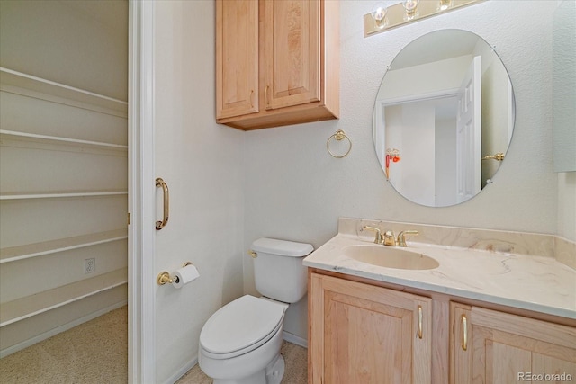 7912 S Buchanan Way, Aurora, CO 80016 - half bathroom featuring vanity and toilet