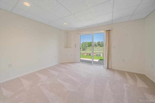 7912 S Buchanan Way, Aurora, CO 80016 - empty room with a drop ceiling, carpet flooring, and recessed lighting