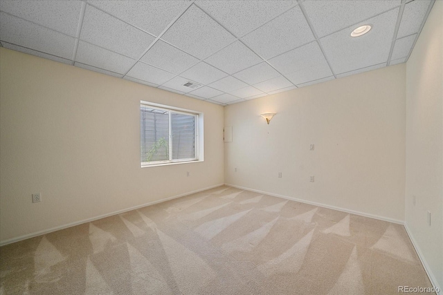 7912 S Buchanan Way, Aurora, CO 80016 - carpeted spare room featuring a drop ceiling and baseboards