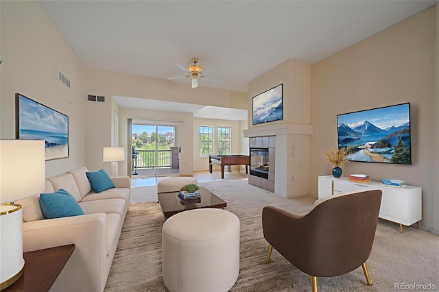 7912 S Buchanan Way, Aurora, CO 80016 - living room featuring a fireplace and a ceiling fan