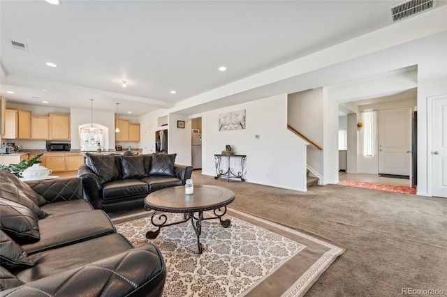 19047 Randolph Pl, Denver, CO 80249 - living area with light colored carpet, stairs, visible vents, and recessed lighting