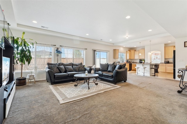 19047 Randolph Pl, Denver, CO 80249 - living area with recessed lighting, light carpet, and visible vents