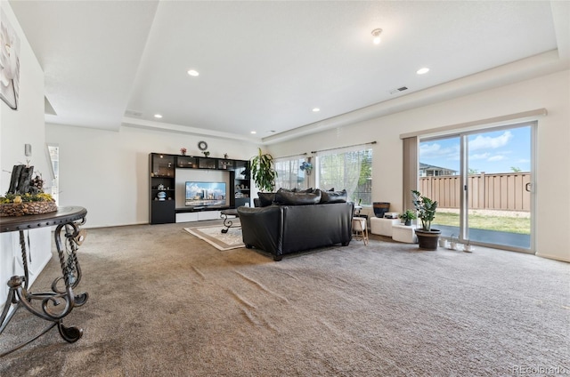 19047 Randolph Pl, Denver, CO 80249 - carpeted living room with visible vents and recessed lighting