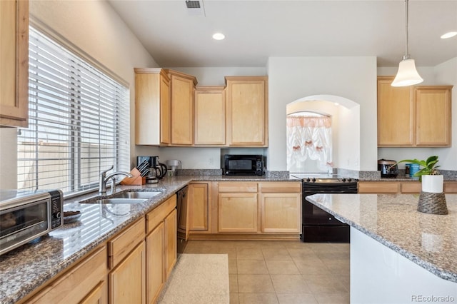 19047 Randolph Pl, Denver, CO 80249 - kitchen featuring black appliances, light brown cabinets, visible vents, and a sink