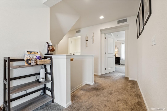 19047 Randolph Pl, Denver, CO 80249 - corridor with an upstairs landing, carpet flooring, and visible vents