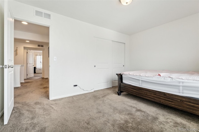 19047 Randolph Pl, Denver, CO 80249 - carpeted bedroom with recessed lighting, a closet, and visible vents