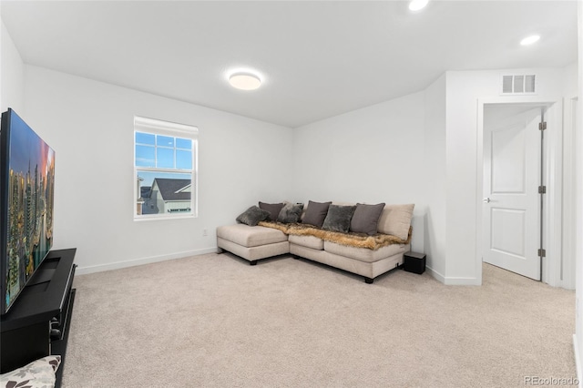 living area with carpet, visible vents, baseboards, and recessed lighting