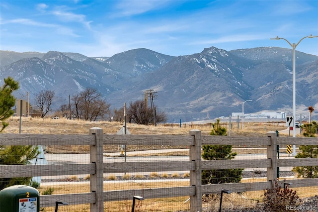 view of mountain feature with a rural view