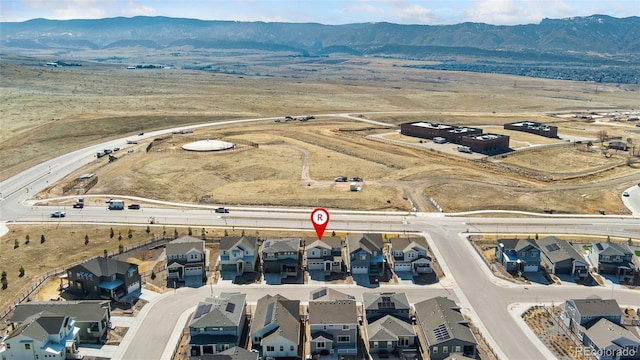 aerial view featuring a residential view and a mountain view