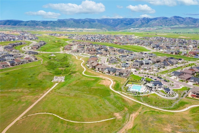 birds eye view of property featuring a mountain view and a residential view