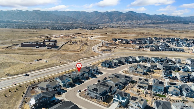 aerial view with a residential view and a mountain view