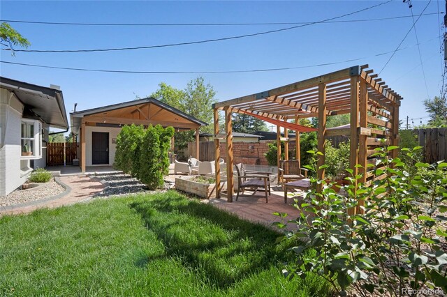 9400 Ridge Rd, Arvada, CO 80002 - fenced backyard with a pergola and a patio area