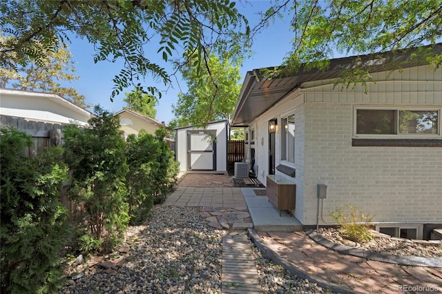 9400 Ridge Rd, Arvada, CO 80002 - view of side of property with a shed and brick siding