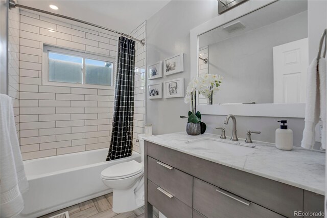 9400 Ridge Rd, Arvada, CO 80002 - bathroom with vanity, shower / bathtub combination with curtain, and recessed lighting