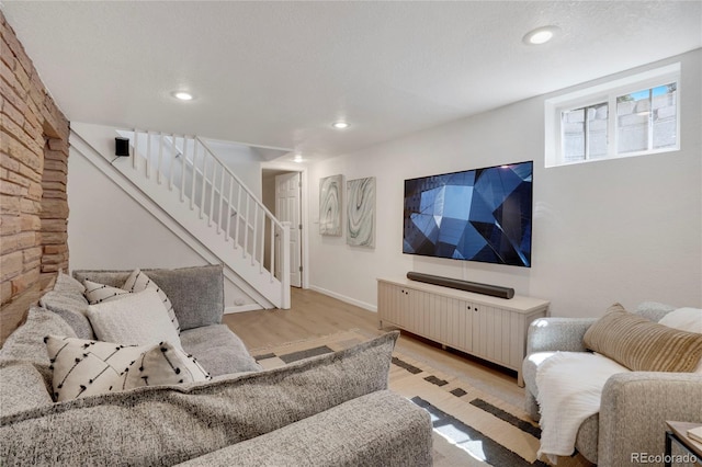 9400 Ridge Rd, Arvada, CO 80002 - living area featuring stairs, light wood finished floors, and recessed lighting