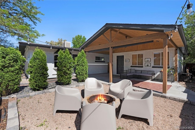 9400 Ridge Rd, Arvada, CO 80002 - view of patio / terrace with an outdoor fire pit