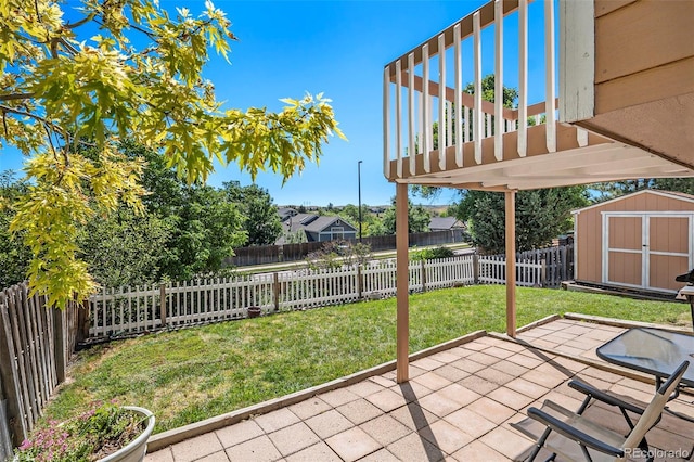 7582 Jared Way, Littleton, CO 80125 - fenced backyard with a storage shed and a patio area