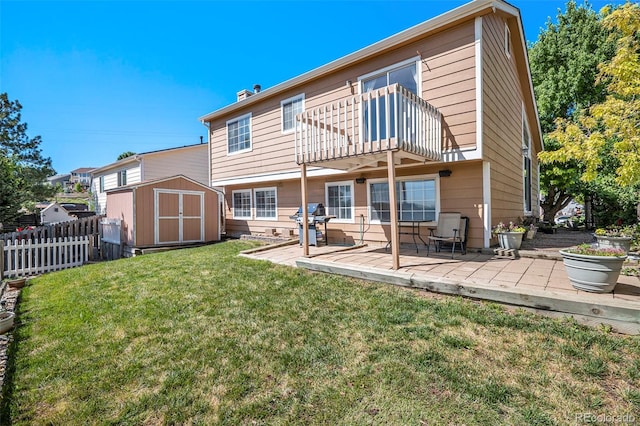 7582 Jared Way, Littleton, CO 80125 - rear view of house featuring a balcony, a shed, a patio, and a chimney