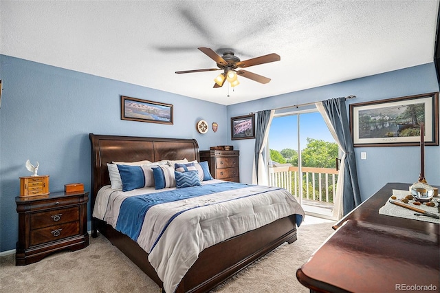 7582 Jared Way, Littleton, CO 80125 - carpeted bedroom featuring access to exterior, a textured ceiling, ceiling fan, and a textured wall