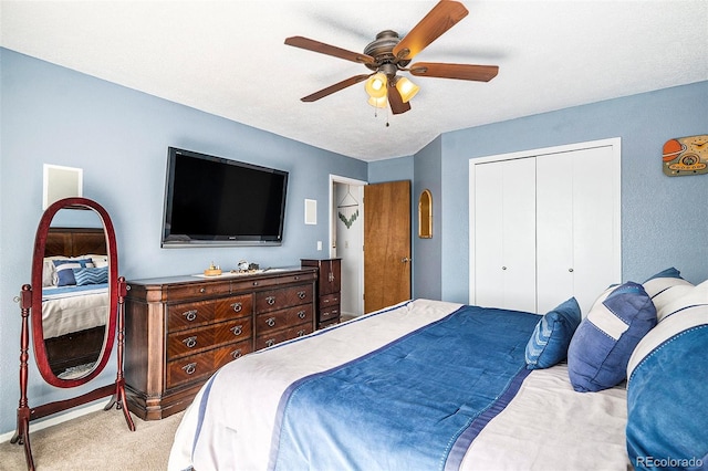 7582 Jared Way, Littleton, CO 80125 - bedroom featuring carpet flooring, a closet, and a ceiling fan