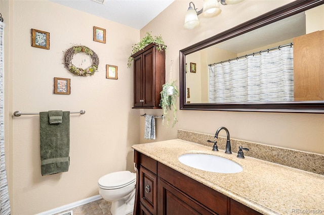 7582 Jared Way, Littleton, CO 80125 - bathroom with toilet and vanity