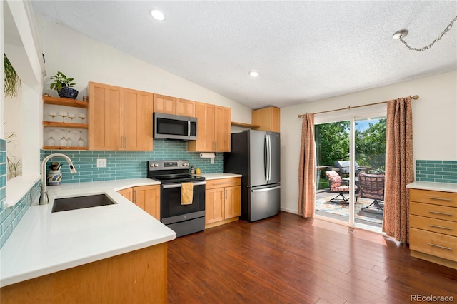 9376 W Wagon Trail Cir, Littleton, CO 80123 - kitchen featuring stainless steel appliances, a sink, open shelves, backsplash, and light countertops