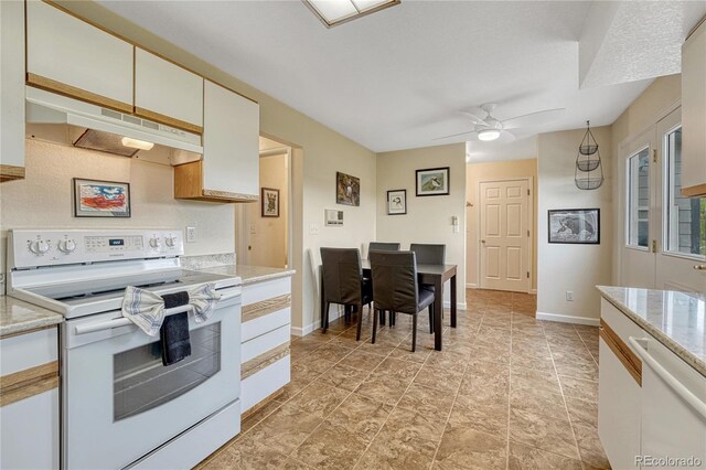 43793 Buckskin Rd, Parker, CO 80138 - kitchen featuring white appliances, under cabinet range hood, ceiling fan, white cabinetry, and light stone countertops