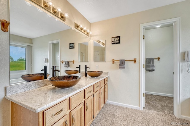 43793 Buckskin Rd, Parker, CO 80138 - full bathroom with double vanity and baseboards