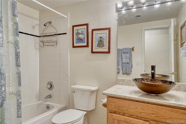 43793 Buckskin Rd, Parker, CO 80138 - full bath with a textured wall, vanity, and shower / bathtub combination with curtain