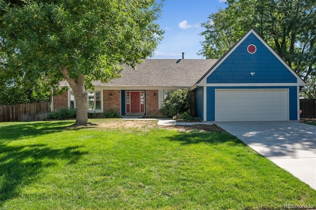 ranch-style house with a front yard and a garage