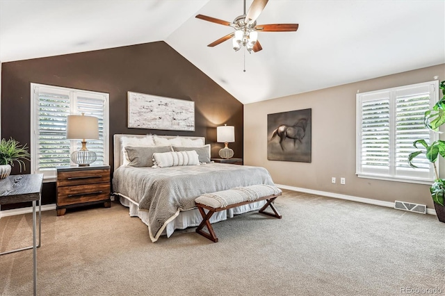 bedroom featuring ceiling fan, carpet floors, and vaulted ceiling