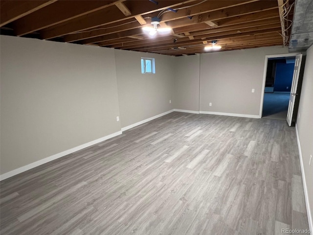 basement with wood-type flooring