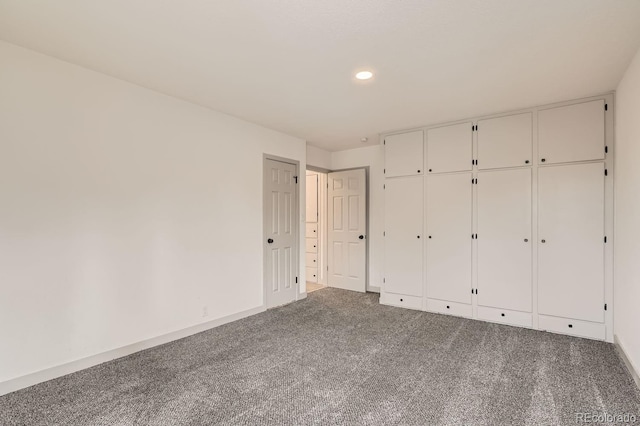 unfurnished bedroom featuring carpet floors and recessed lighting