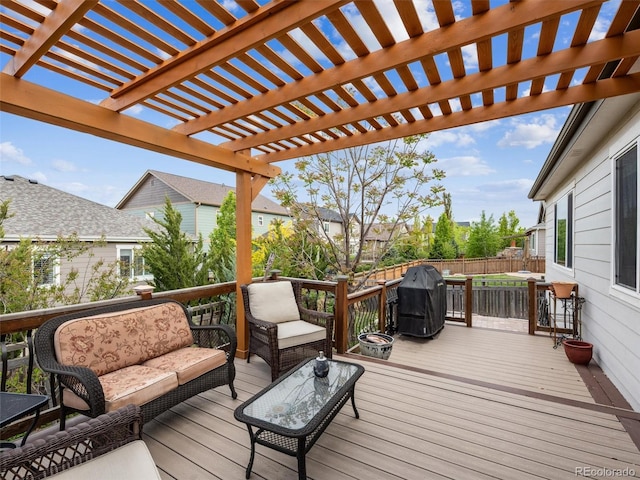 deck featuring fence private yard, an outdoor hangout area, grilling area, and a pergola