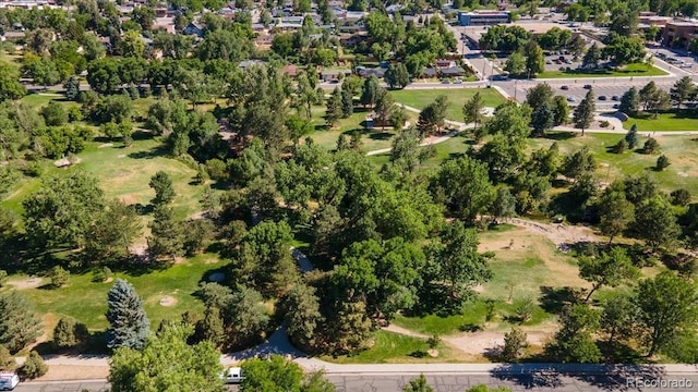 6007 Yarrow St Unit D, Arvada, CO 80004 - aerial view of property's location featuring a tree filled landscape