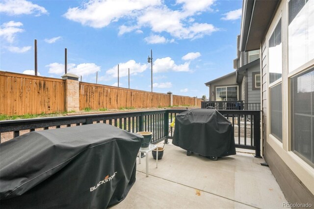 11524 Dewey St, Parker, CO 80138 - view of patio / terrace featuring grilling area and a fenced backyard