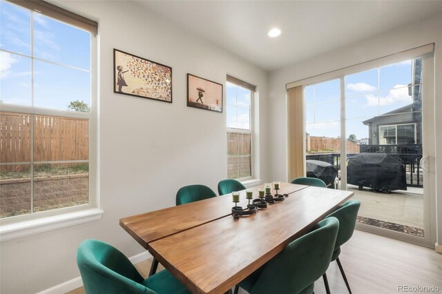 11524 Dewey St, Parker, CO 80138 - dining area with recessed lighting, baseboards, and light wood-style floors