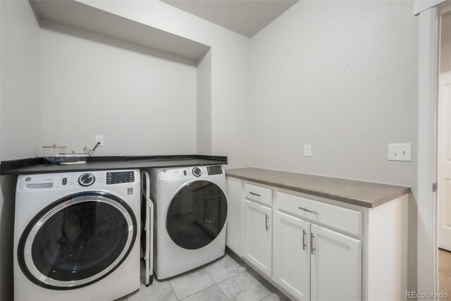 11524 Dewey St, Parker, CO 80138 - laundry area with light tile patterned flooring and washer and dryer