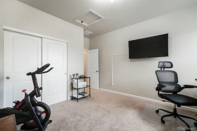11524 Dewey St, Parker, CO 80138 - exercise room featuring baseboards, carpet, and attic access
