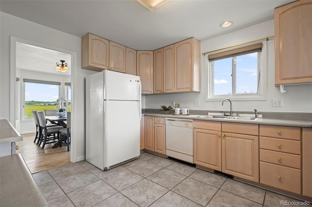46531 Sundance Trl, Parker, CO 80138 - kitchen featuring white appliances, light brown cabinets, and healthy amount of natural light