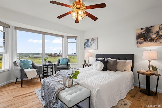 46531 Sundance Trl, Parker, CO 80138 - bedroom with light wood-style flooring and a ceiling fan