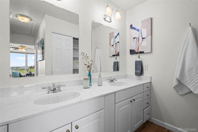 46531 Sundance Trl, Parker, CO 80138 - full bath featuring double vanity and wood finished floors