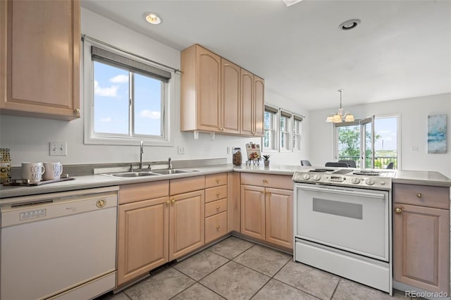 46531 Sundance Trl, Parker, CO 80138 - kitchen featuring white appliances, light brown cabinetry, a chandelier, light tile patterned floors, and light countertops