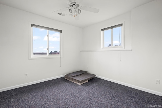 46531 Sundance Trl, Parker, CO 80138 - carpeted spare room featuring healthy amount of natural light and ceiling fan
