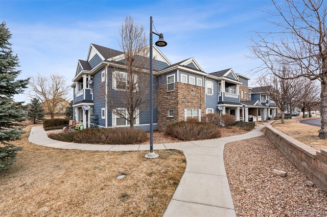 view of property exterior with a residential view