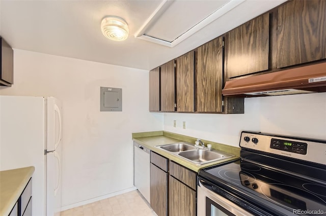 3436 S Locust St Unit D, Denver, CO 80222 - kitchen featuring stainless steel appliances, a sink, extractor fan, electric panel, and baseboards