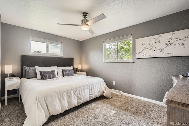 6046 Vrain St, Arvada, CO 80003 - carpeted bedroom with a textured wall, baseboards, ceiling fan, and a textured ceiling